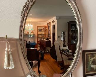 ornate silver oval wall mirror