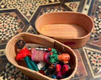 Small worry dolls in box 