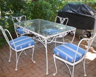 Vintage wrought iron patio table and chairs
