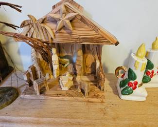 Nativity made of unusual wood stylized feathures