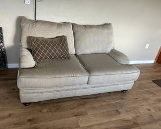 Tan cloth love seat