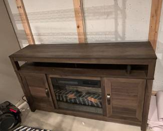 Entertainment cabinet with electric fireplace 