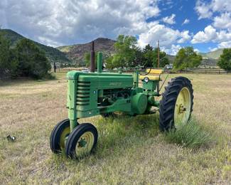 John Deere tractor 
Ran when it was parked 