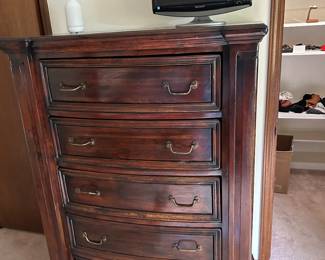 Tall dresser 
Does have some trim missing on the bottom drawer 