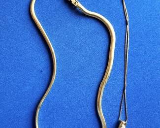 18k rope necklace and 14k emerald and diamond necklace