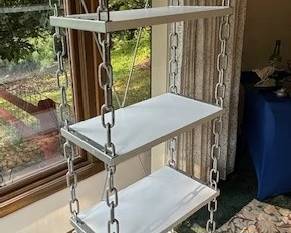 Modern white and chain bookcase