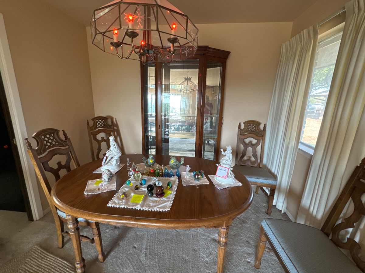 Curio cabinet-$150, rare collectibles, table & 4 chairs $100