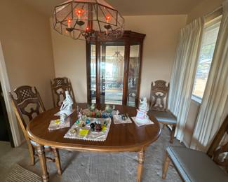 Curio cabinet-$150, rare collectibles, table & 4 chairs $100