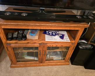 Oak Credenza there's a Blue Ray DVD Player inside