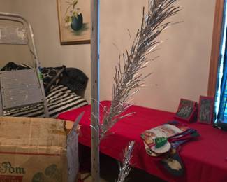 Very Cool - Funny Picture - This is a 6' Sparkler Aluminum Pom Pom Christmas Tree - We where going to put it together but it's all in original in package. 