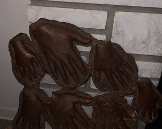 Betty Newman Maguire bronze hands sculpture