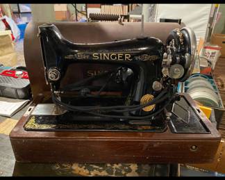 Singer in bentwood box