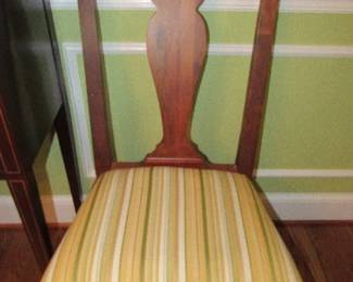 One of the set of chairs with the Samuel Case dining room set