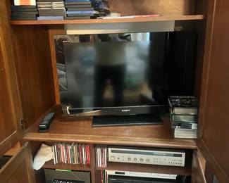 Hundreds of CD's and DVD's. TV.