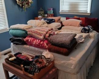 Queen Size Bed and Large Variety of Bedding! 