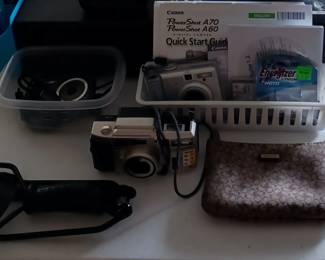 Sample of Digital Cameras and a Slingshot!