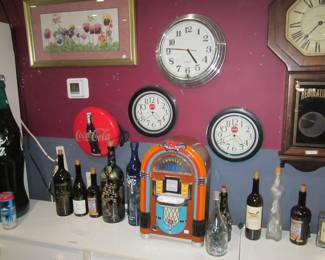 Clocks & Lighted wine bottles