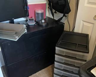 Two drawer vertical file, monitor and burnable cds