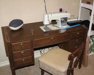 Kenmore 1750 cabinet sewing machine and attachments