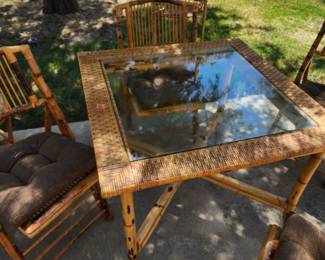 Bamboo Rattan cir 1967 dinner table with glass top. $750.00