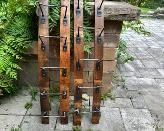 2 custom wine racks, made from reclaimed wine barrels