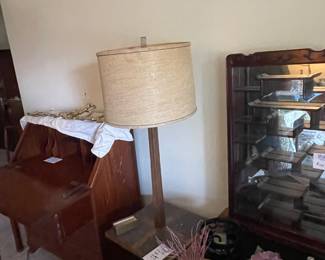 George  Zee  slant top desk and chair 
Mid century western Brandt Ranch oak table lamp and magazine rack 