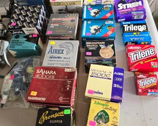 Fishing gear reels in boxes