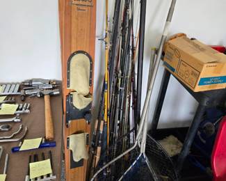 Vintage water skis, fishing rods & nets