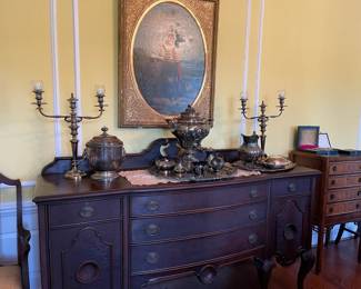 The mahogany buffet with 6 drawers and 2 doors. 24 1/2" x 72" x 38 1/2" tall.