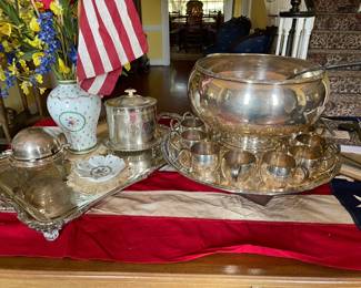 A close look at the silver plate punch bowl and other pieces.
