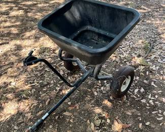 Pull behind fertilizer spreader