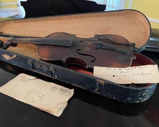 Documentation with violin confirming that this is a reproduction