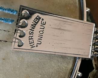 It does have a Kershner Unique Tailpiece on it.