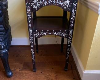 Antique, Japanese table inlaid with mother of pearl, with shelf 16" square, 31" tall. This piece is also original to the house