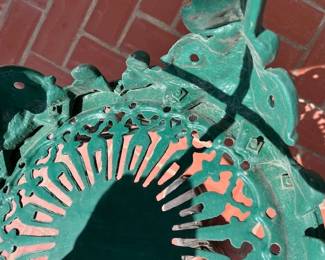 Looking at the top of the of the iron chairs