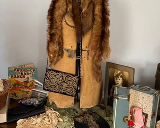 Antique dress form with adjustable height extension, vintage purses, crochet purses, fox fur collars, vintage doll wardrobe