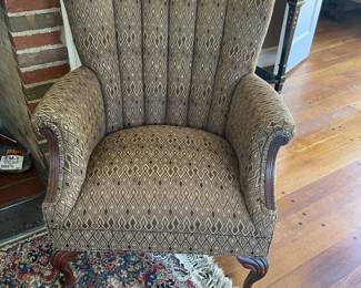 A second channel back upholstered arm chair
