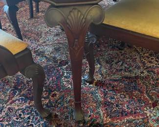 The detail on the legs of the dining table