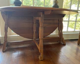 Vintage Ranch Oak drop leaf dining table. We have lots more pieces in the Pool House. This furniture is known for its sturdy construction and rustic look.