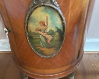 This is the hand painted panel on the side table/commode