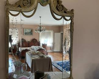 Antique gold leaf rubbed mirror with hand painted panel, swag details