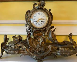 A close look at the Antique French Clock with ornate brass mountings 24 1/2" x 18 1/2"
