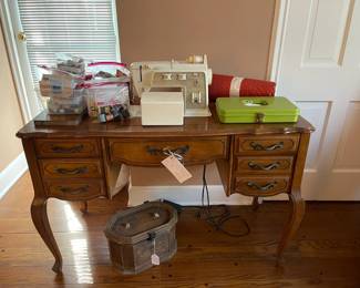 Singer Golden Touch Sewing Machine with attachments and sewing table. Lots of sewing notions, vintage sewing boxes