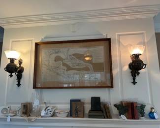 Matching lights with the antique map from 1780 between them.