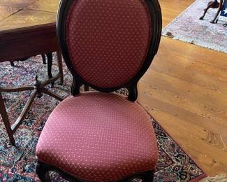 Victorian arm less chair with brocade upholstery. There are two of these chairs and they match the three panel Victorian sofa