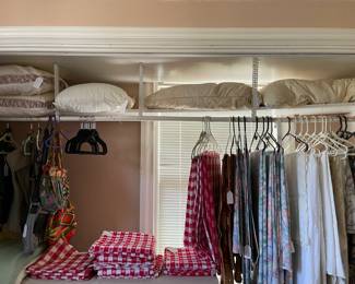 These linens are in the master bedroom dressing area, pillows, vintage table cloths, bags and purses
