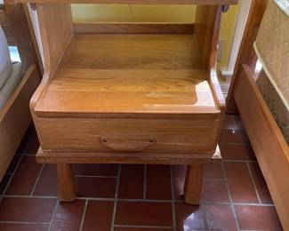 We have two Vintage A. Brandt Ranch Oak bedside tables and they are also in the Pool house
