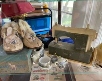 A close look at the fabulous shoes with original box and the toy sewing machine made by Necchi and the doll tea set