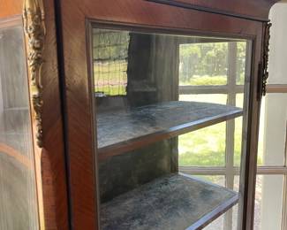 Ormolu details on the French Vitrine