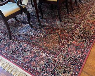 Looking at the Karastan 10' x 14' rug in the dining room